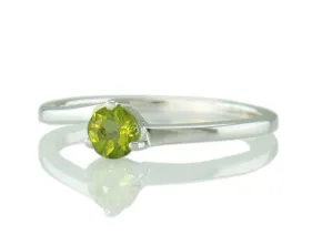 Silver ring with Peridote