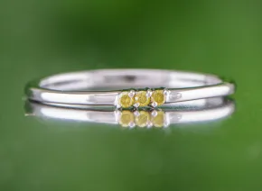 Elegant Ring with Yellow Diamonds